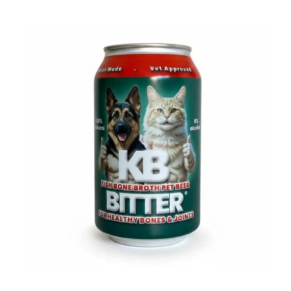 A can of KB Bitter Fish Bone Broth Pet Beer featuring a green label with images of a German Shepherd and a cat, on a white background.